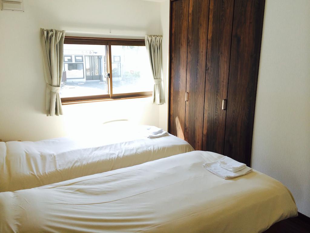 Вилла Kashiwa House Фурано Номер фото